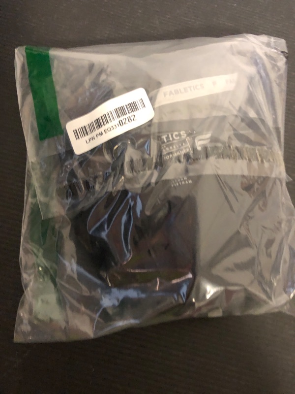 Photo 1 of Fabletics Men's Helix 1-Pocket Scrub Top - MotionTech, Wrinkle-Resist, Chest Pocket, Anti-Shrink, Semi-Slim Fit, L, Black