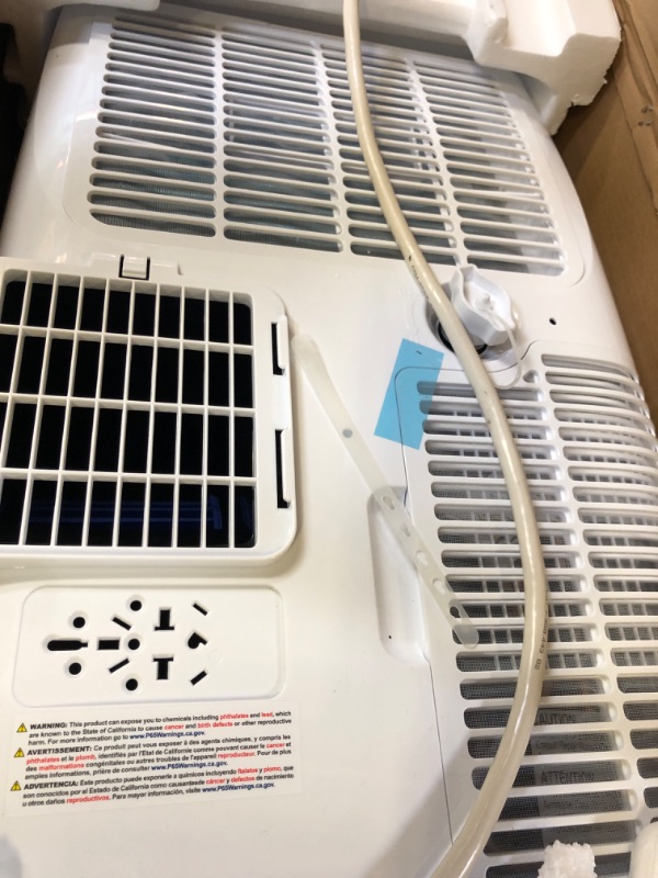 Photo 1 of BLACK+DECKER Smart Portable Air Conditioner, 14,000 BTU (10,200 BTU SACC) for Rooms up to 700 Sq. Ft., Smart Portable AC with Follow Me Remote and Window Kit, BPACT14WT, White