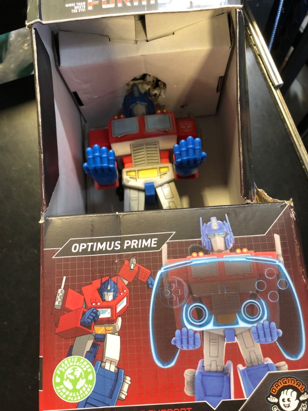Photo 1 of Cableguys - Transformers Optimus Prime Gaming Accessories Holder & Phone Holder for Most Controller (Xbox, Play Station, Nintendo Switch) & Phone