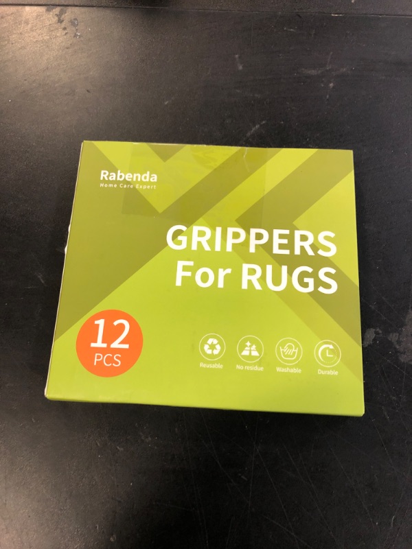 Photo 1 of Rabenda 12 Pcs Rug Tape, Non Slip Rug Pads Grippers for Hardwood Floors and Tiles, Reusable Carpet Tape for Area Rugs, Double-Sided Adhesive Rug Stickers Keep Corners Flat (Black)