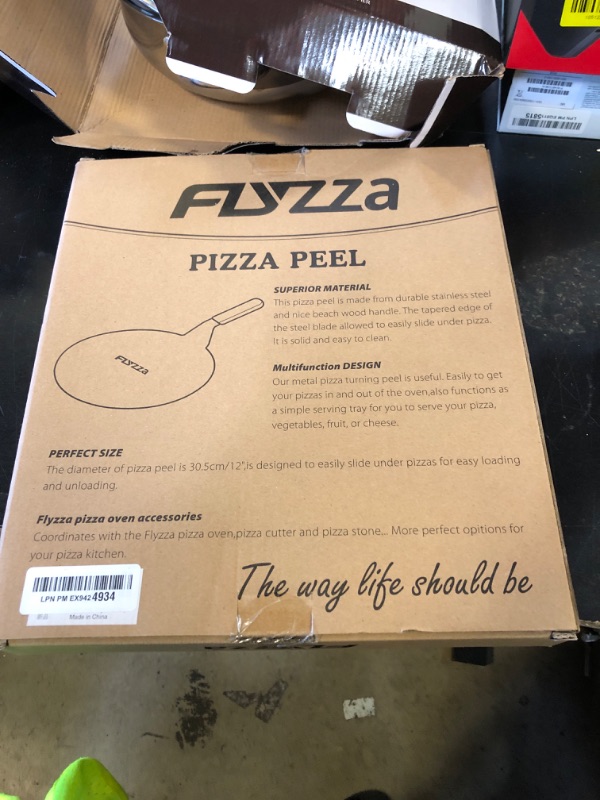 Photo 1 of FLYZZA 12 Inch Stainless Pizza Peel, Pizza Spatula with Ergonomic Long Wood Handle for Pizza Oven Baking, Turing Peel for Pizza, Dough, Bread Pastry
