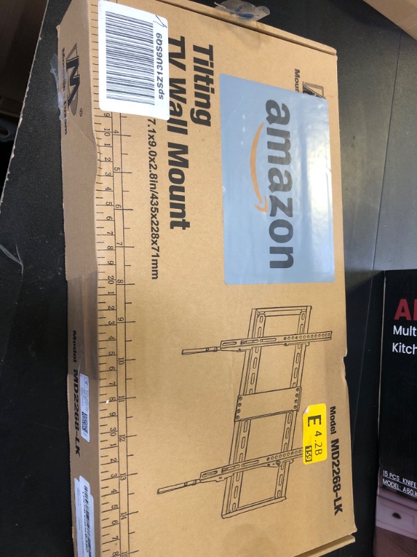 Photo 1 of Mounting Dream UL Listed TV Mount for Most 37-75 Inch TV, Universal Tilt TV Wall Mount Fit 16", 18", 24" Stud with Loading Capacity 132lbs, Max Vesa 600 x 400mm, Low Profile Flat Wall Mount Bracket