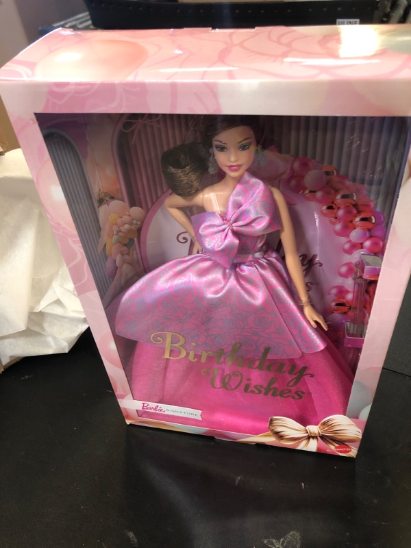 Photo 1 of Barbie Signature Birthday Wishes Doll, Collectible Fashion Doll in Satiny, Pink Dress with Wavy Brown Hair and Giftable Packaging