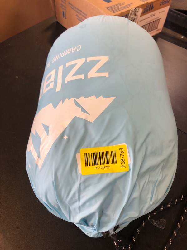 Photo 1 of zzlamb Packable & Lightweight Camping Blanket, Soft Travel Duck Down Throw Quilt 650 Fill Power, Compact Warm Down Lap Blanket for Couch Airplane Car Picnic RV Backpacking Beach, 50x77in Blue