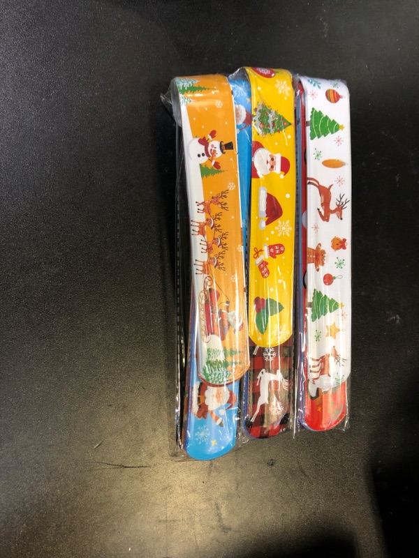 Photo 1 of Christmas Slap Bracelets 48Pcs Christmas Party Favors for Kids Christmas Stocking Christmas Bracelets Christmas Party Supplies Christmas Gifts for Class Kids Goodie Bag Fillers Toys for Kids