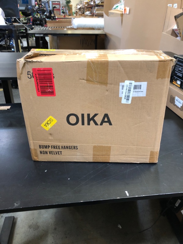 Photo 1 of OIKA Hangers 50 Pack No Shoulder Bump - Space Saving Huggable Closet Hangers with 360° Rotating Hooks, Heavy Duty Non-Slip for Shirts, Pants, Coats (Black)
