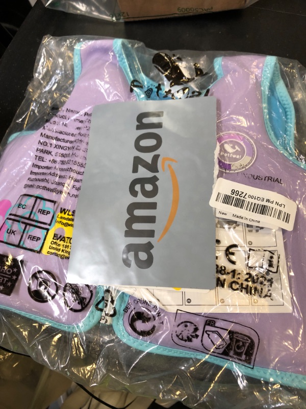 Photo 1 of Pottwal Swim Vest for Kids - Swim Jacket for 1-2 Years (24-33LBS) - Buoyancy Aid Made of Neoprene & EPE - with Adjustable Crotch Strap - Purple