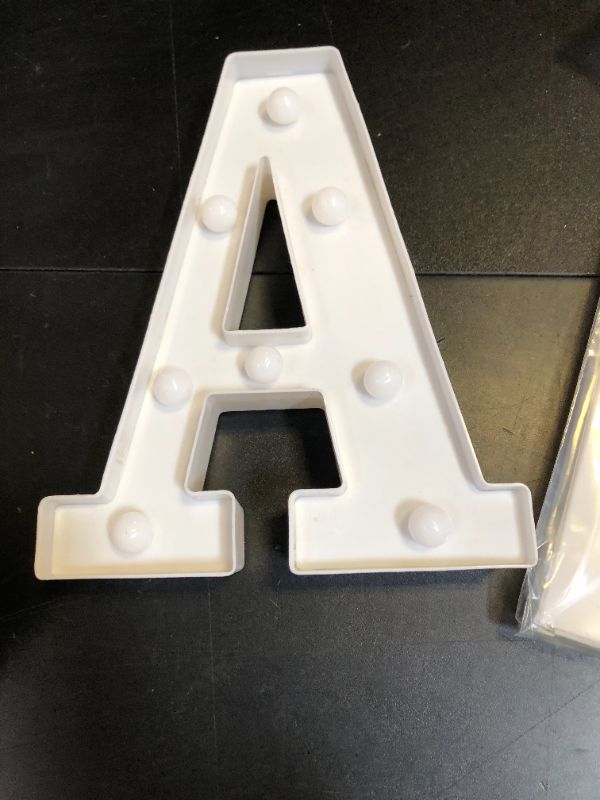Photo 1 of DyingSwan Small Led Marquee Letters, Light Up Letters, 8.58 Inch Led Letter Lights, Battery Powered Lighted Sign for Table, Party, Birthday, Christmas Decor (Letter A)