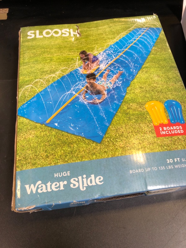Photo 1 of Sloosh Huge Water Slide, 30ft x 6ft Heavy Duty Lawn Water Slip and Slide with Built-in Sprinkler and 2 Slip Inflatable Boards for Kids Adults Party Summer Yard Lawn Outdoor Play Activities