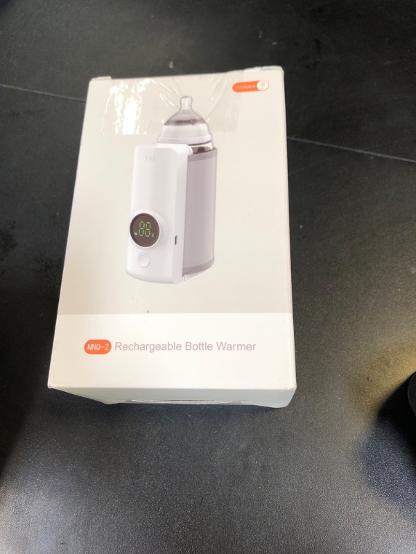 Photo 1 of Portable Bottle Warmer for Travel, Fast Warming Comfortable Baby Feeding On The Go, Waterless Milk Warming with Battery-Powered for Home Outdoor