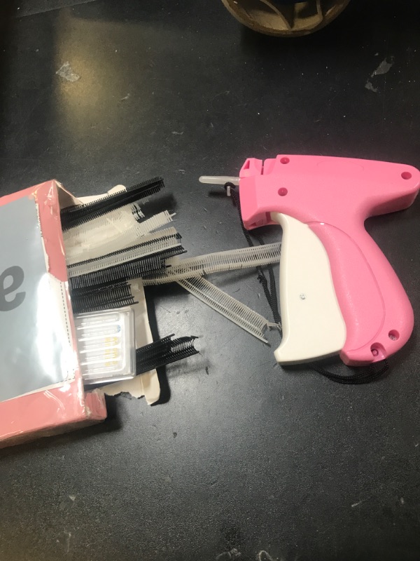 Photo 1 of Scopck Handheld Stitch Tag Gun for Clothes, Quick Clothing Fixer, Tagging, Sewing Kit Includes 6 Needle, 1000 Black Fasteners & 1000 White Fasteners, Pink