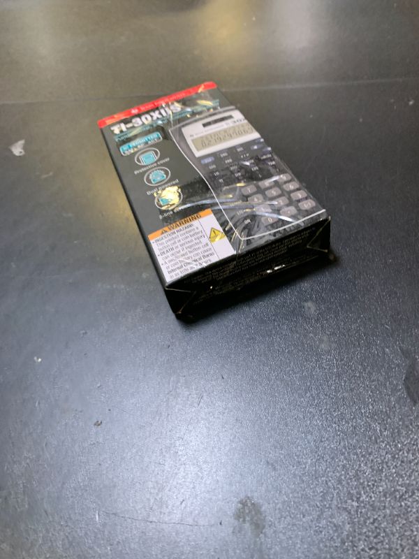 Photo 1 of Texas Instruments TI-30XIIS Scientific Calculator, Black with Blue Accents