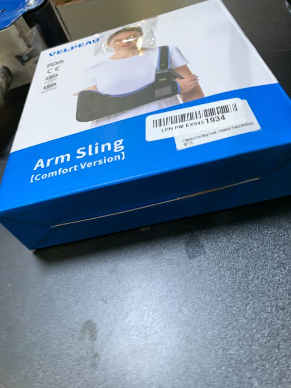 Photo 1 of VELPEAU Arm Sling Shoulder Immobilizer for Women and Men, fit Left or Right Arm - Rotator Cuff Support Brace -Medical Sling for Shoulder, Clavicle, Elbow Injury (Comfort type, Medium: Bust 29.5?-33.5?)