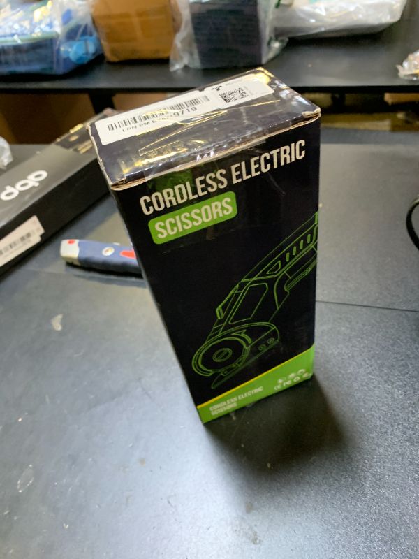 Photo 1 of Cordless Electric Scissors: 4V Rechargeable Rotary Cardboard Cutter, 3000mAh Battery, with LED Light, 2 Blades, Box Cutter for Fabric Carpet Carton Plastic Leather Cloth