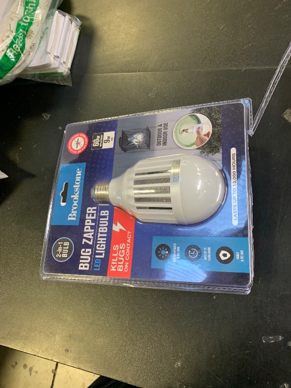 Photo 1 of Brookstone Bug Zapper Light Bulb - 2-in-1 White Light & Blue LED Insect Killer, Chemical-Free, Non-Toxic, Easy Clean Catch Tray, 15,000 Hours, Safe for Children & Pets, Indoor/Outdoor Use
