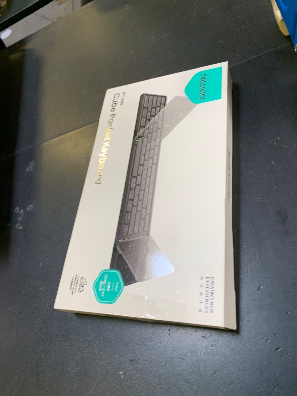 Photo 1 of Nillkin Foldable Travel Keyboard with Touchpad & Number Pad, Bluetooth Wireless Portable Folding Full Size Keyboard with Trackpad for PC Laptop iPad Tablets Smartphone, Silicone Leather Cover, Black