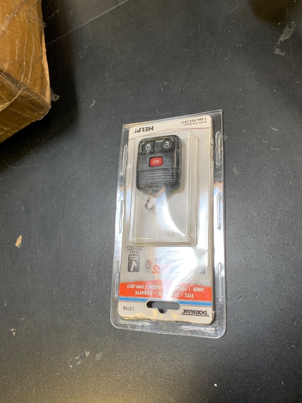 Photo 1 of Dorman 13798 Keyless Entry Remote 3 Button Compatible with Select Models