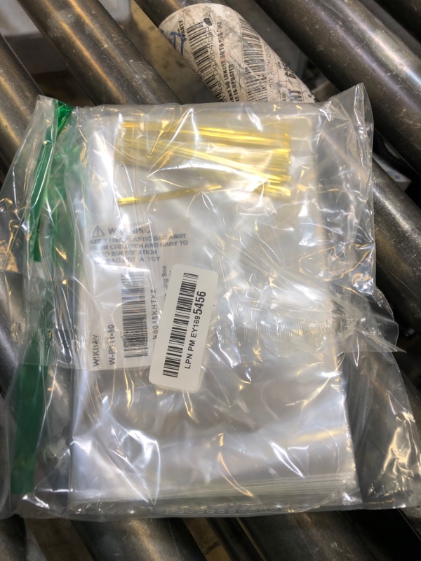 Photo 1 of WIKDAY Cellophane Bags 50 PCS 8x11 Inches Clear Gift Gags with Ties Plastic Treat Party Favor Candy Bags for Gift Giving, Packaging Snack, Products