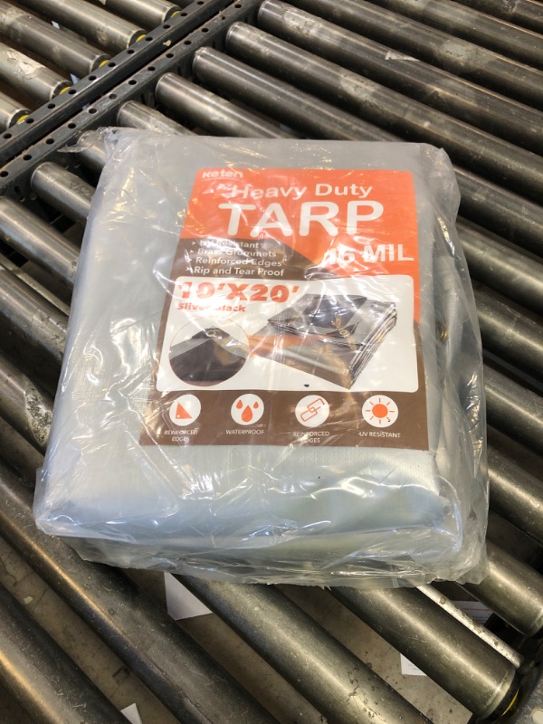 Photo 1 of Keten Tarps Heavy Duty Waterproof 10X20 Feet, Extra Thick 16 Mil, Tear & Fade Resistant, 100% UV Blocking, Outdoor Tarp with Reinforced Grommets for Roof, Camping, Patio, Pool, Boat(Silver/Black)