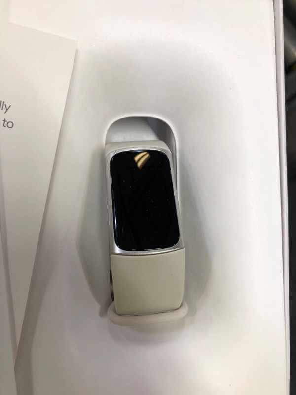 Photo 1 of Fitbit Charge 6 Fitness Tracker with Google apps, Heart Rate on Exercise Equipment, 6-Months Premium Membership Included, GPS, Health Tools and More, Porcelain/Silver, One Size (S & L Bands Included)