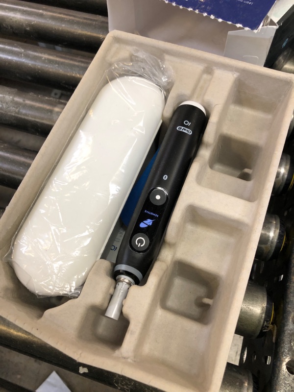Photo 1 of Oral-B iO Series 6 Rechargeable Electric Toothbrush with Visible Pressure Sensor to Protect Gums, 2 Minute Timer, 5 Cleaning Settings, 1 Replacement Toothbrush Head, and Travel Case, Black