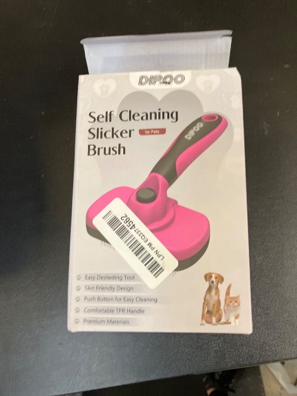 Photo 1 of Dipoo Self-Cleaning Pet Grooming Brush - Skin-Friendly Deshedding Tool for Dogs & Cats in Pink, Removes Loose Hair and Tangles