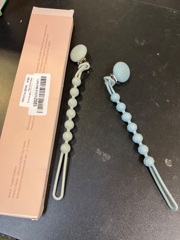 Photo 1 of Cuddle Campus Silicone Pacifier Clip Holder with One Piece Design, Pack of 4 Soft Flexible Binky Clips with Texture for Baby Boy and Girl (0-6M) Set 1