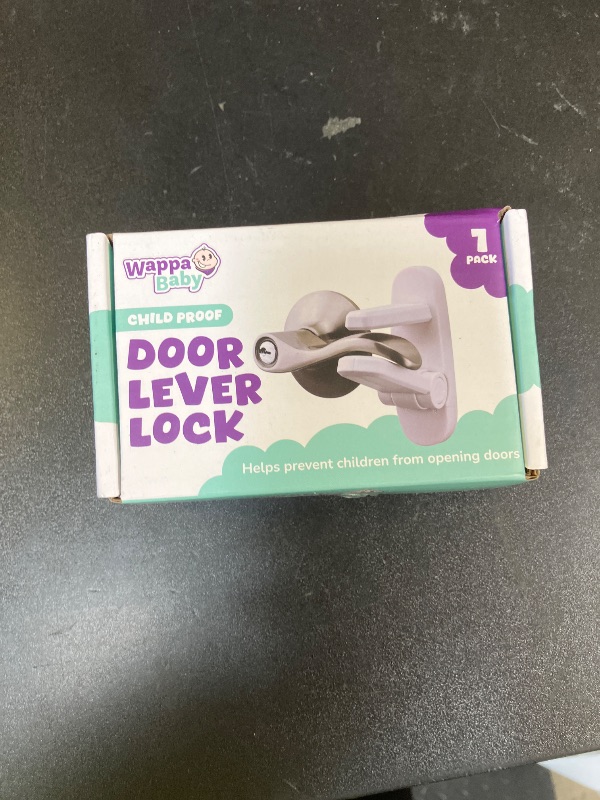 Photo 1 of Door Lever Lock (1 Pack) Prevents Toddlers from Opening Doors. 3.25" L * 1.5" W * 4.5" H Easy One Hand Operation for Adults. Durable ABS with 3M Adhesive Backing. Simple Install, No Tools Needed.
