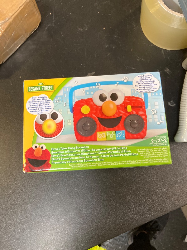 Photo 1 of Just Play Sesame Street Elmo Take Along Boombox with Lights & Sounds, 5.5-inch Interactive Toy, Learning and Education, Kids Toys for Ages 2 Up