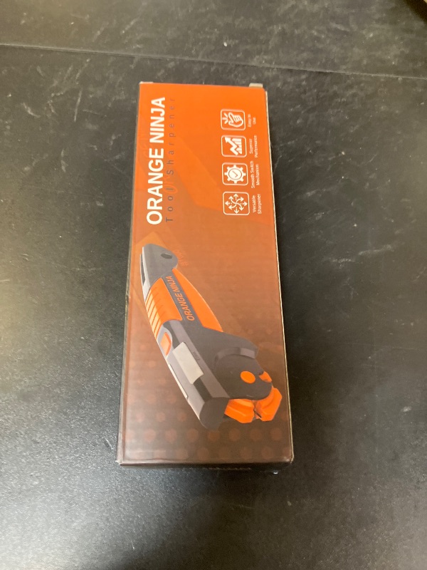 Photo 1 of Orange Ninja 7-in-1 Garden Tool & Knife Sharpener – Sharpens Lawn Mower Blades, Axe, Hatchet, Machete, Pruner & Hedge Shears – Repairs & Hones Edges by Sharp Pebble