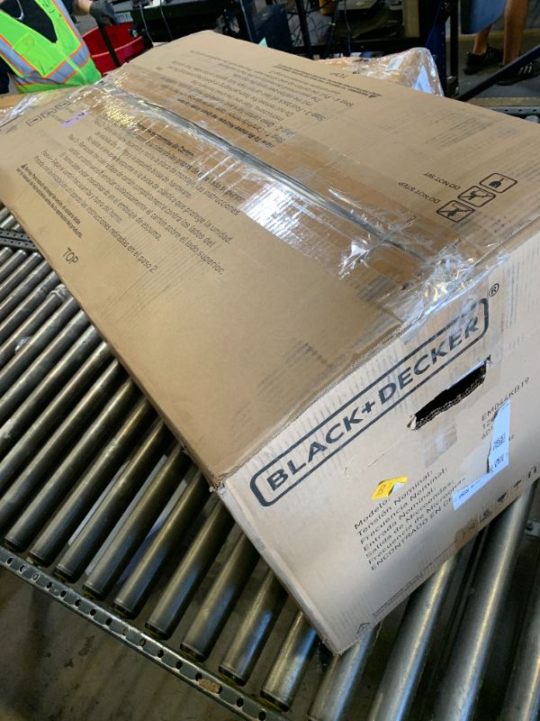 Photo 1 of BLACK+DECKER EM044KB19 Over The Range Microwave Oven with One Touch, 1000 Watts, 400 CFM and Auto Cooking, OTR 1.9 Cu.ft