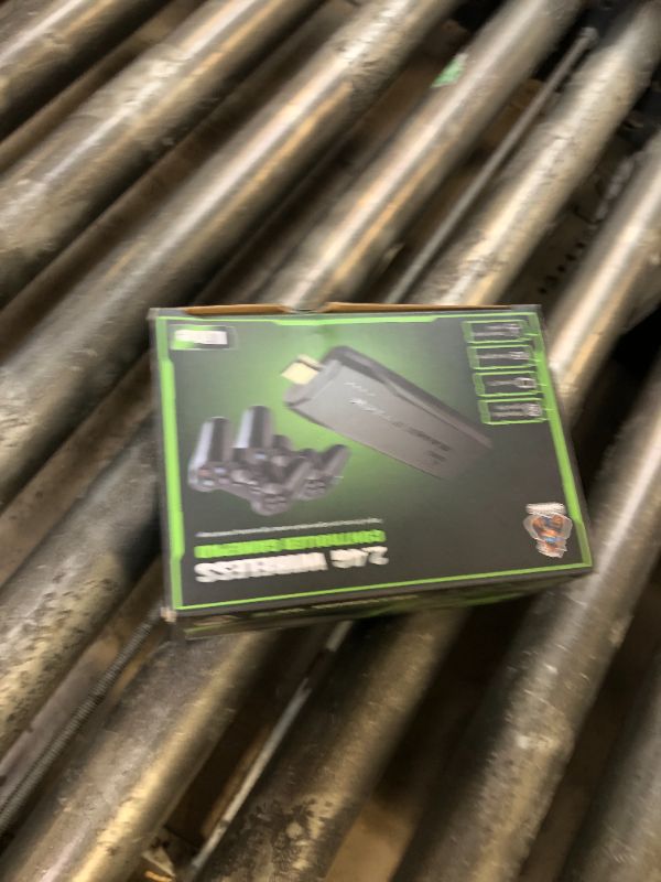 Photo 1 of Wireless Retro Game Console, Retro Game Stick with Built-in 9 Emulators, 64GB,20,000+ Games, 4k Definition, and 2.4GHz Wireless Controller, Plug and Retro Play Video Games for TV.