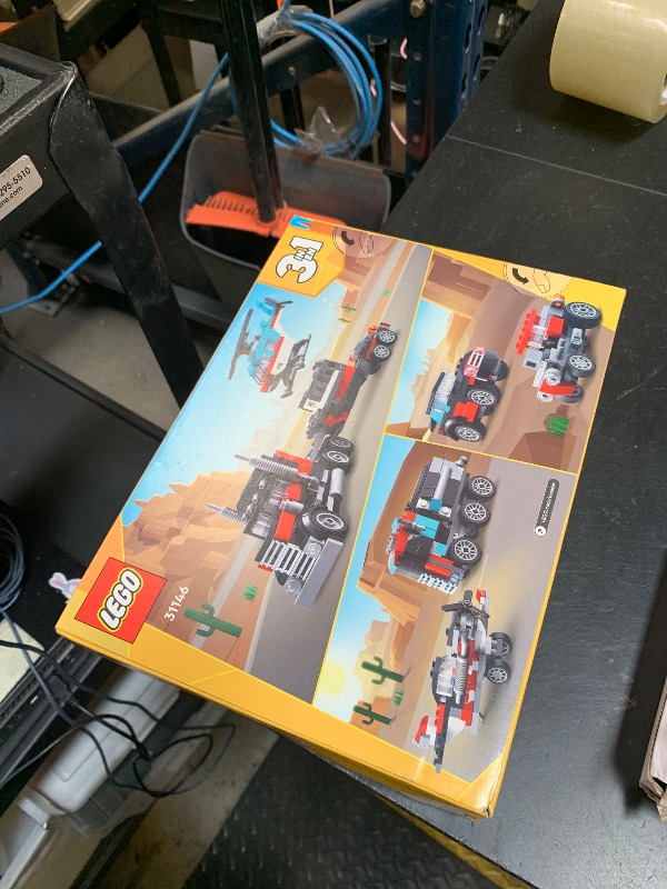 Photo 1 of LEGO Creator 3 in 1 Flatbed Truck with Helicopter Toy, Transforms from Flatbed Truck Toy to Propeller Plane to Hot Rod and SUV Car Toys, Gift Idea for Boys and Girls Ages 7 Years Old and Up, 31146