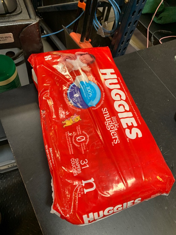 Photo 1 of Huggies Size Newborn Diapers, Little Snugglers Baby Diapers, Size Newborn (up to 10 lbs), 31 Count, Packaging May Vary