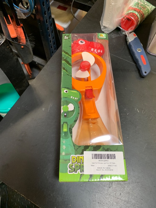 Photo 1 of QearFun Dinosaur Handheld Misting Fan with Water Spray,Personal Fan with Battery Operated,Portable Kids Fan for Boys, Cute Fan with Mist to Keep Cool Off (Red)