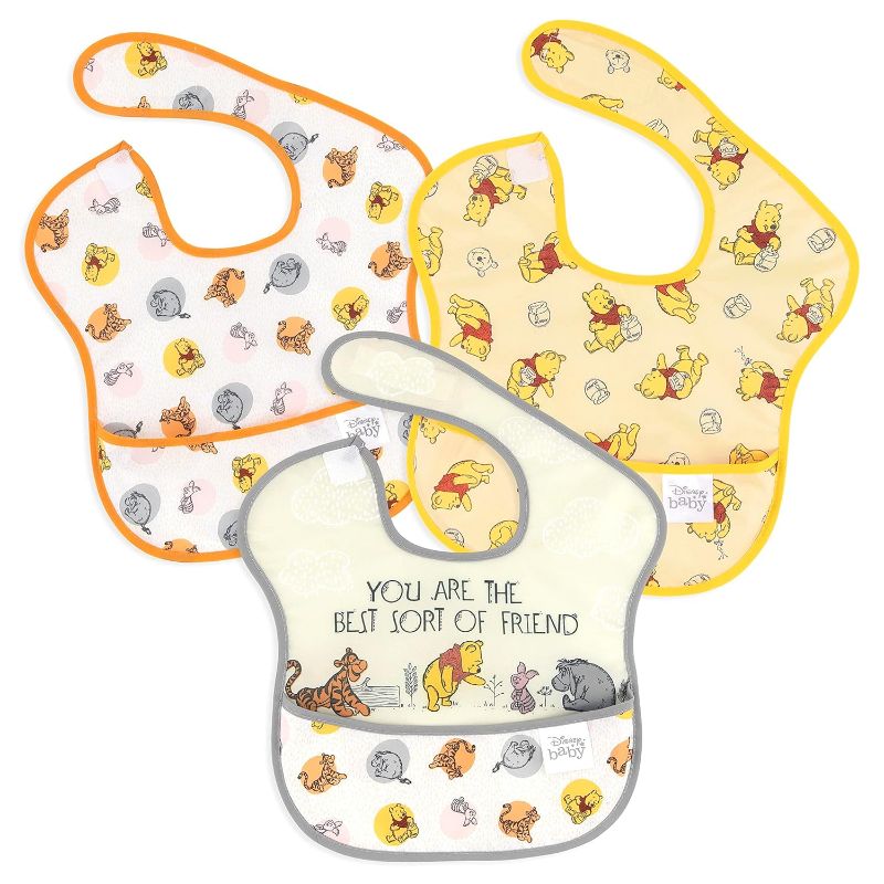 Photo 1 of Bumkins Disney Bibs for Girl or Boy, SuperBib Baby and Toddler 6-24 Months, Essential Must Have for Eating, Feeding, Baby Led Weaning, Mess Saving Waterproof Soft Fabric, 3-pk Pooh Bear and Friends
