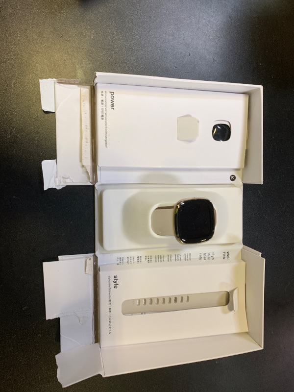 Photo 1 of Fitbit Sense Advanced Smartwatch with Tools for Heart Health, Stress Management & Skin Temperature Trends, White/Gold, One Size (S & L Bands Included)