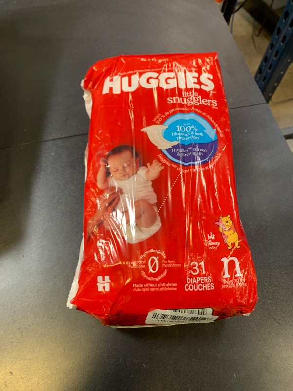 Photo 1 of Huggies Size Newborn Diapers, Little Snugglers Baby Diapers, Size Newborn (up to 10 lbs), 31 Count, Packaging May Vary