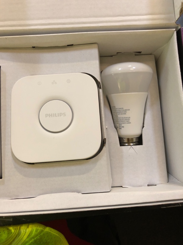 Photo 1 of Philips Hue Smart Light Starter Kit - Includes (1) Bridge and (4) 75W A19 E26 LED Smart White and Color Ambiance Bulbs - Control with App - Compatible with Alexa, Google Assistant, and Apple HomeKit