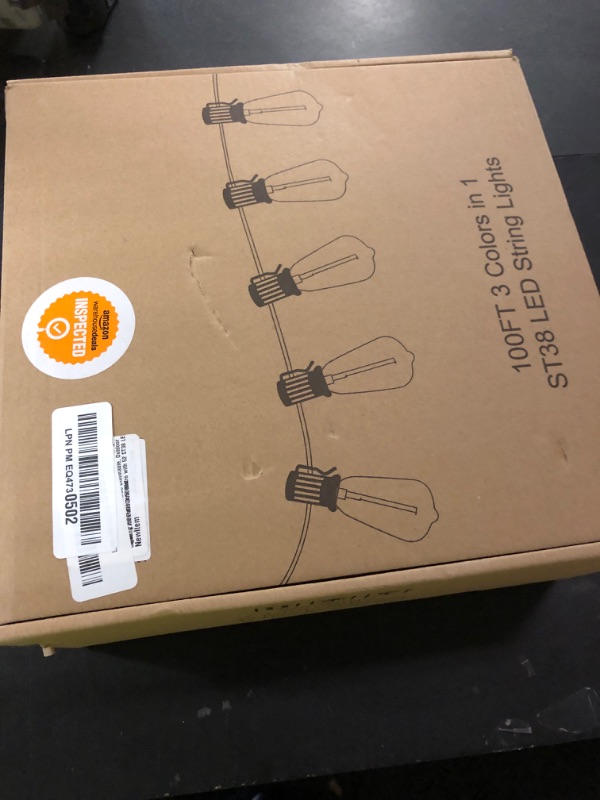 Photo 1 of Brightever 3 Color in 1 LED Outdoor String Lights with Remote, 100FT Edison Hanging String Lights for Outside Dimmable, Outdoor Lighting for Patio Café Bistro with 52 ST38 LED Bulbs, 2700K/4000K/5000K
