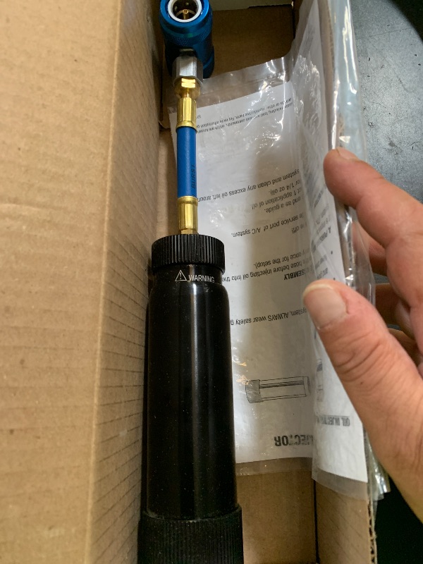 Photo 1 of Mastercool 53123-YF Refillable Oil and Dye Injector for R1234yf Systems – 2 oz Capacity – Anodized Aluminum Body – Smooth-Twist Handle – SAE J2888 & EPA Compliant