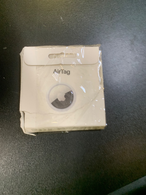 Photo 1 of Apple AirTag. Keep Track of and find Your Keys, Wallet, Luggage, Backpack, and More. Simple one-tap Set up with iPhone or iPad