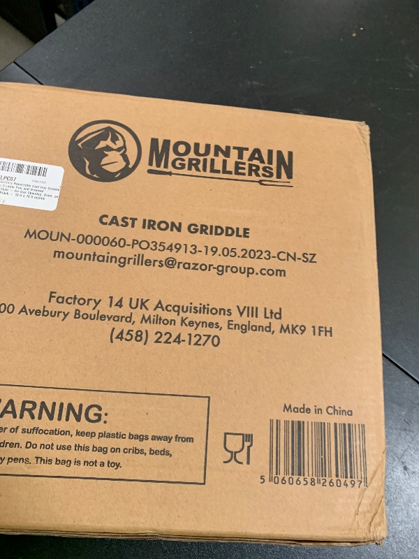 Photo 1 of Mountain Grillers Reversible Cast Iron Griddle - Flat Top Griddle Pan and Grooved Grill-Pan Style - for Gas Stovetop, Oven, and Open Fire, Black - 10.6 x 10.6 Inches