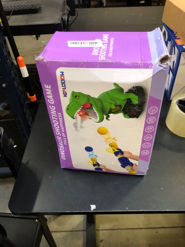 Photo 1 of NIPLOOOW Dinosaur Shooting Toys for Kids 3-5 Years, Movable Target Shooting Games with 2 Air Pump Launcher, Interactive Competition Game Gift for Boys and Girls Ages 3 4 5 6 7 8 Years Old
