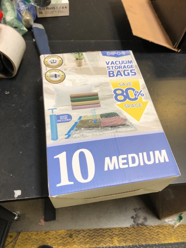 Photo 1 of 10 Pack Medium Vacuum Storage Bags with Hand Pump, 80% Storage Space Saving, Sturdy Leak-Free Space Saver Vacuum Seal Bags for Clothing, Vacuum Compression Bags for Travel Lugggage