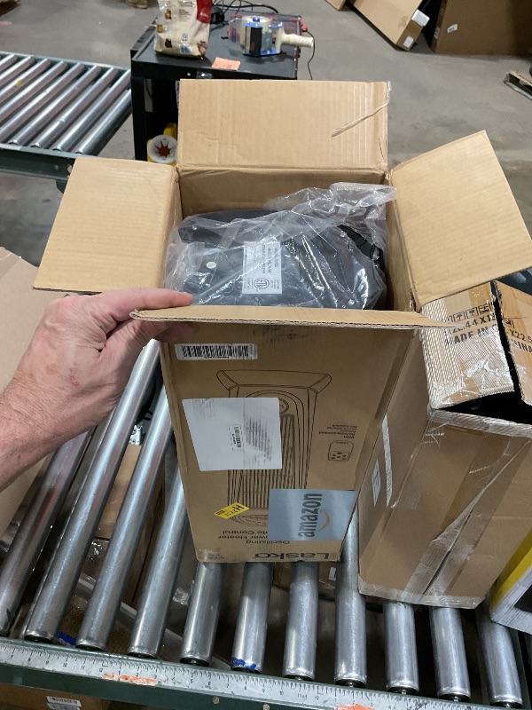 Photo 1 of ***FOR PARTS ONLY NON-FUNCTIONAL*** Lasko 1500W Ceramic Tower Space Heater with Remote, Thermostat, Timer & Widespread Oscillation, Portable Electric Heater for Indoor Use, Bedroom & Living Room, 751320