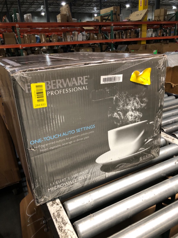 Photo 1 of ***FACTORY SEALED*** Farberware 1.1 Cu. Ft. Countertop Microwave Oven – 1000 Watt Power, Auto Cook Settings, Defrost, Easy Clean and Child Safety Lock - Stainless