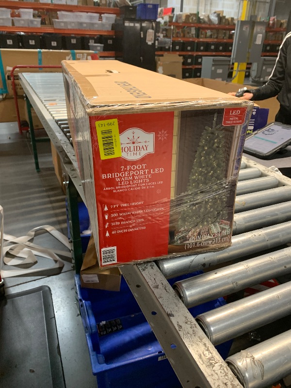 Photo 1 of  7ft Prelit Christmas Tree, Artificial Christmas Tree with 450 Warm White Lights, 1450 Branch Tips, Metal Stand and Hinged Branches