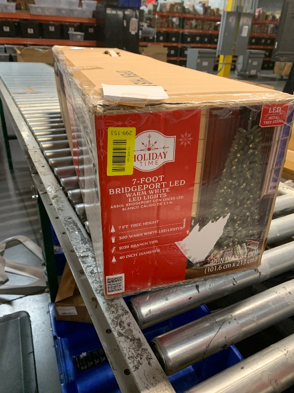 Photo 1 of  7.ft Prelit Christmas Tree, Artificial Christmas Tree with 450 Warm White Lights, 1450 Branch Tips, Metal Stand and Hinged Branches