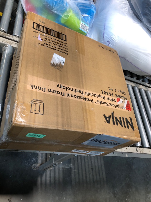 Photo 1 of ***FACTORY SEALED****
Ninja SLUSHi Frozen Drink & Slushie Machine with RapidChill Technology | 88 oz. Easy Fill Vessel | 5 Preset Programs | Make Margaritas, Frappés, & More | With Dishwasher Safe Parts | Black | FS301